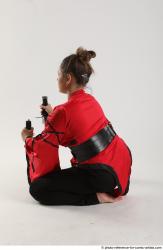 Katerina Ninja Kneeling Pose